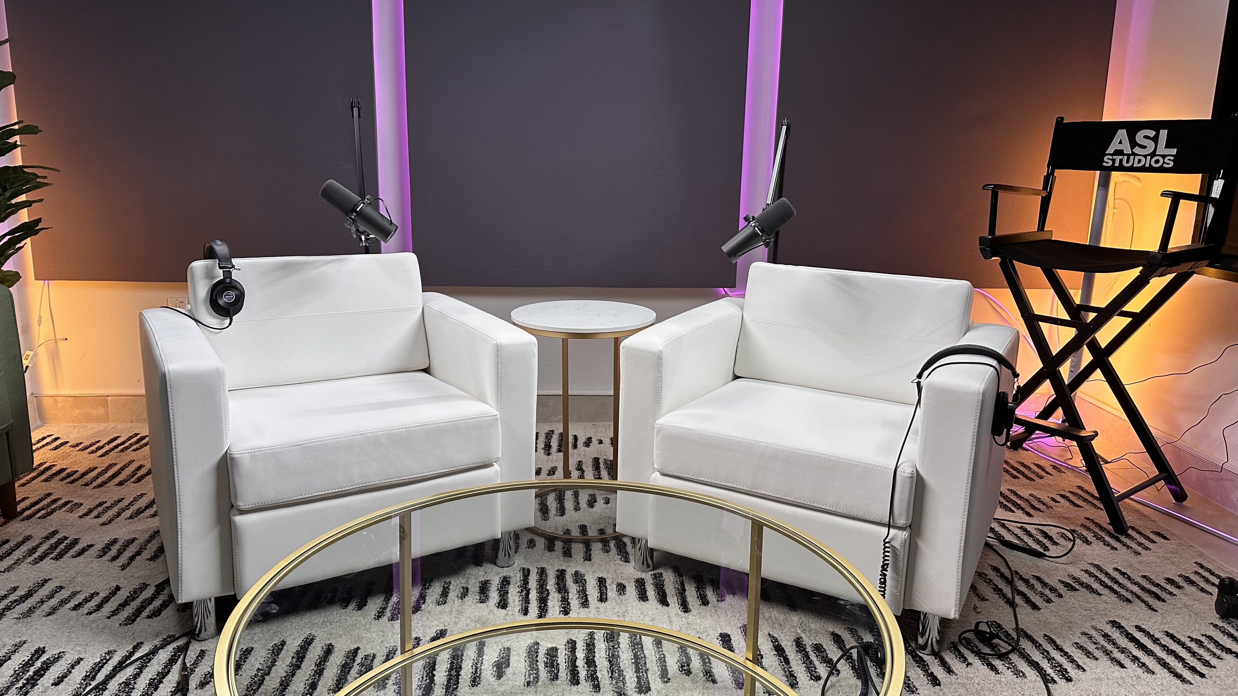 White chairs with purple lighting in background for video podcast at asl studios in nyc