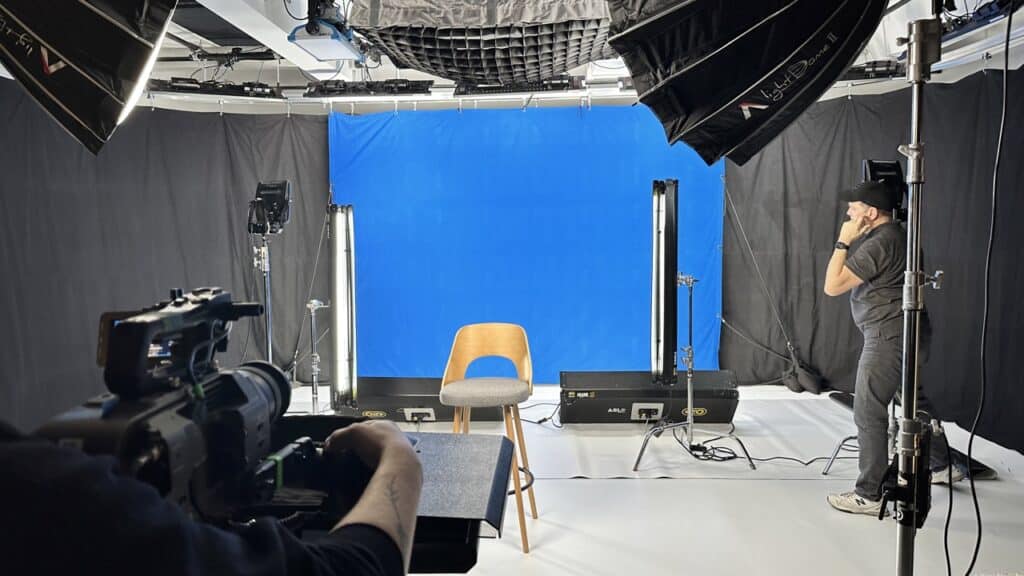 Blue Screen shoot in asl studios. a single chair sits in front of a well lit blue screen scene. 