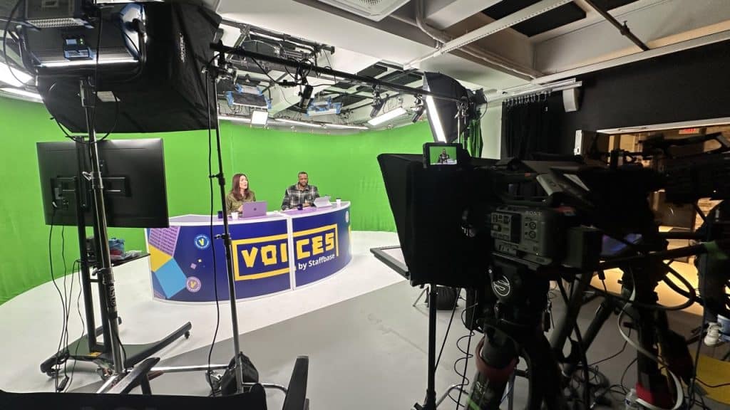 behind the scenes with voices desk and two anchors during rehearsal at asl studios live stream