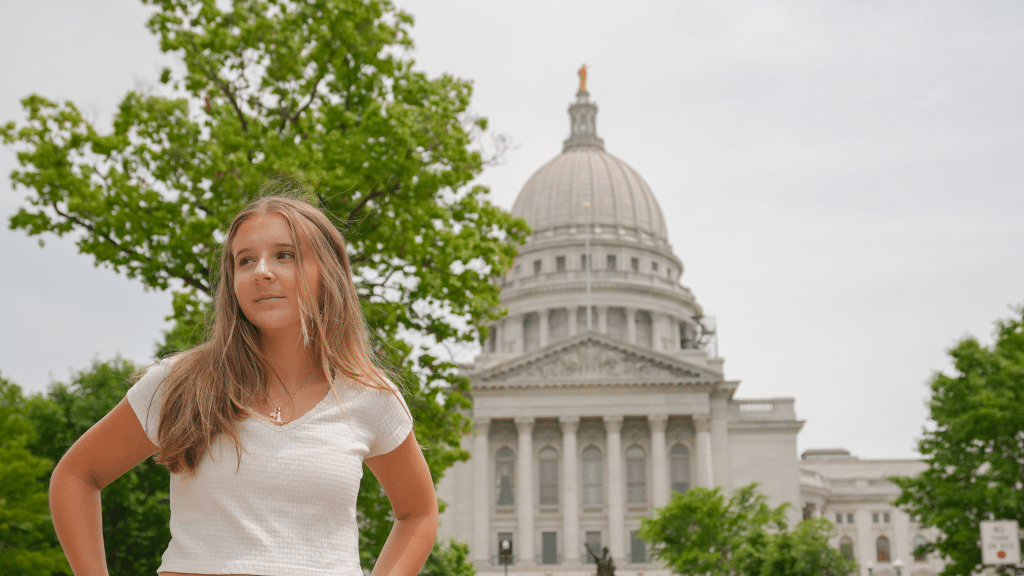 Annalise posing in front of the capital building in Madison, Wisconsin for Annalise