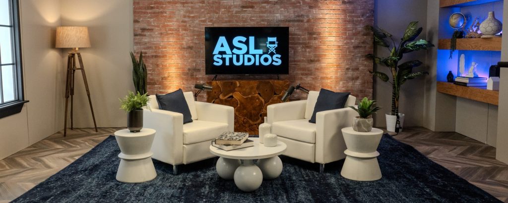 living room set for interviews, podcasts and videos with brick wall and lighting at asl studios in nyc