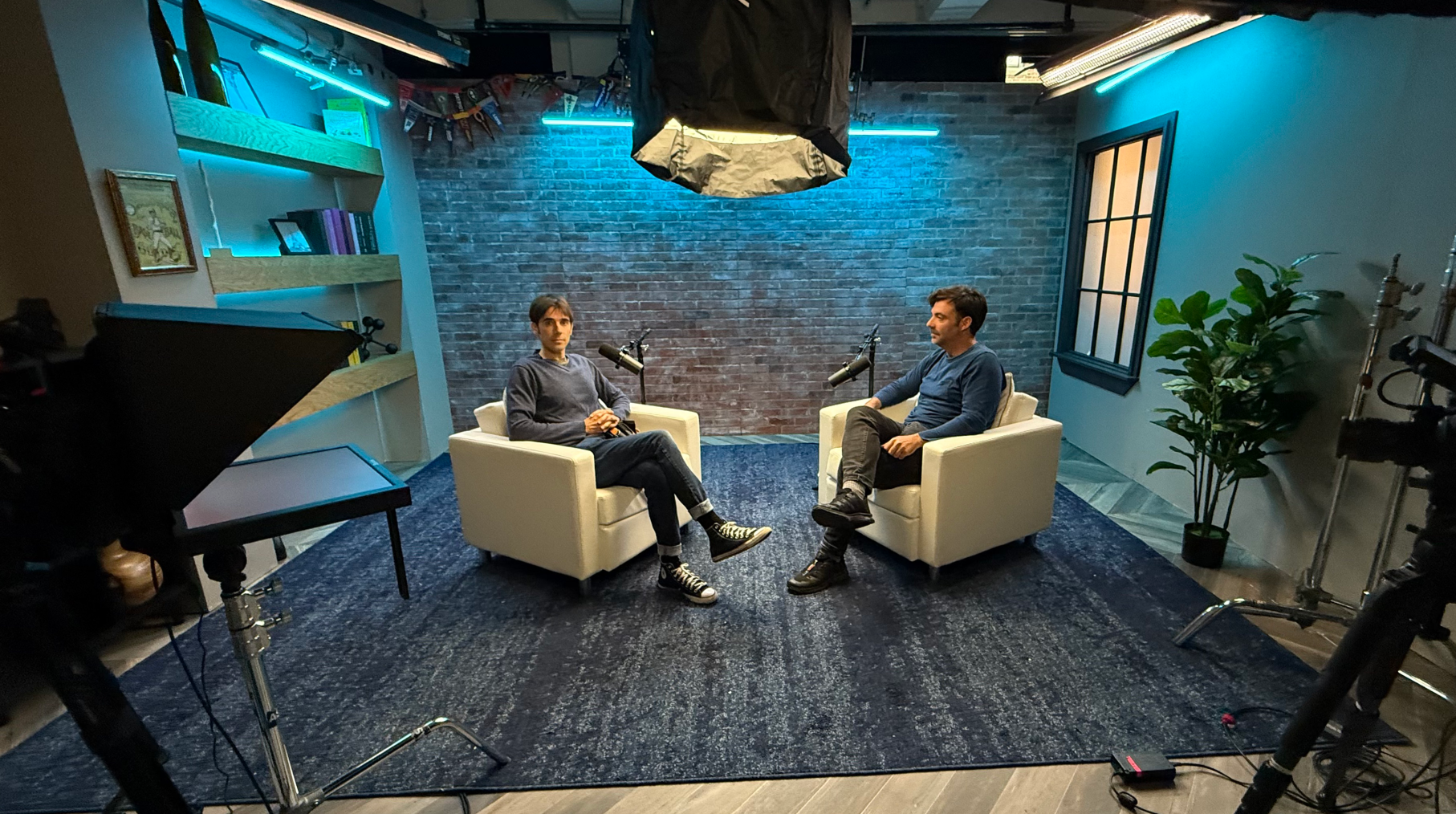 blue living room set podcast studio